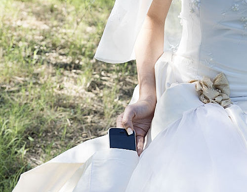 Wedding dress with a cell phone pocket